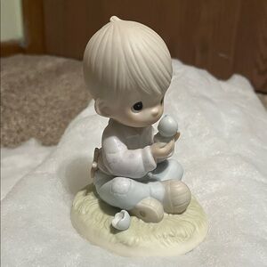 Adorable Figurine of Child with Bird